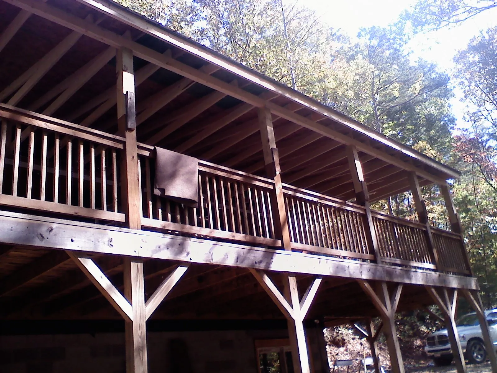 Timber framing under a new elevated porch and deck — Roof Leak Repair in Canyon by Roofing Brothers